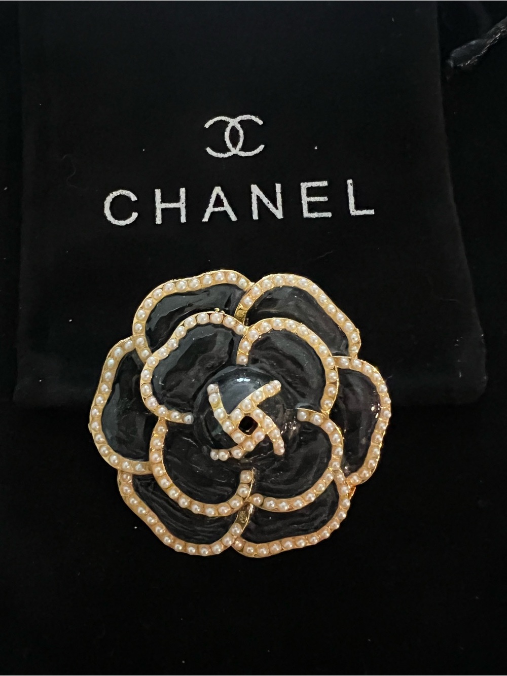 CHANEL Black Enamel Camellia Brooch with Gold-Tone and Pearled Trim